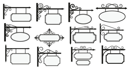 Obraz premium Collection of various vintage-style hanging shop signs featuring ornate scrollwork brackets, chains, and blank boards ready for custom branding.