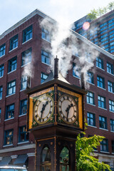 Gastown steam clock blowing steam in vancouver, british columbia