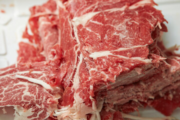 Obraz premium raw meat ,Sliced ​​frozen raw meat
