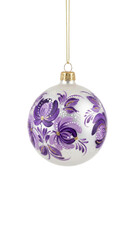 White matte Christmas ball ornament with hand painted purple flowers and gold glitter isolated.