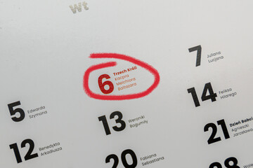 Calendar page marked with the date January 6, highlighting the holiday of Epiphany, featuring names of the three wise men, creating a festive atmosphere for cultural celebrations.