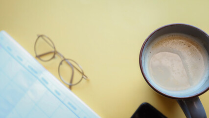 Flat lay background, workplace with coffee cup and documents, flat lay, coffee break