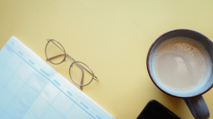 Flat lay background, workplace with coffee cup and documents, flat lay, coffee break