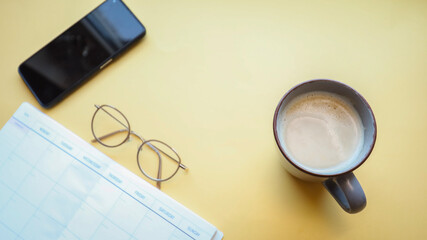 Flat lay background, workplace with coffee cup and documents, flat lay, coffee break