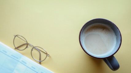 Flat lay background, workplace with coffee cup and documents, flat lay, coffee break