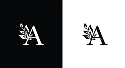 Decorative initial letter A decorated with a delicate leaf vine shown in both positive and negative versions for branding.