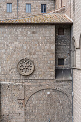 Italy - Viterbo - Cattedrale di San Lorenzo - Circular rose window and relieving arch over medieval passage