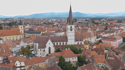 Obraz premium Aerial View of Saint Mary’s Lutheran Cathedral Emphasizing Architectural Details and Cityscape, Sibiu, Romania