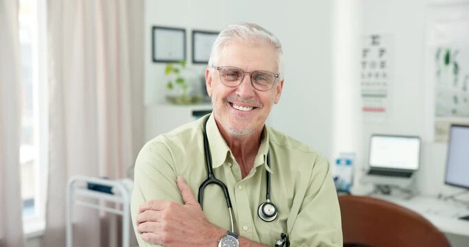 Doctor, mature man and arms crossed with face in office with confidence for medical admin or online consulting. Person, medicine expert and portrait in clinic with smile, technology and healthcare