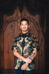 man in indonesian batik shirt