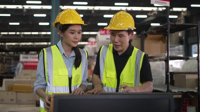 Blue collar workers are working at warehouse. Logistics, transportation.