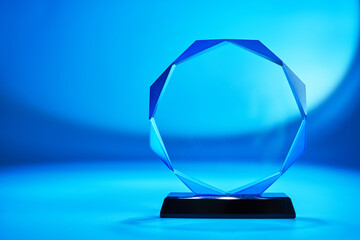 crystal trophy against blue backgroound