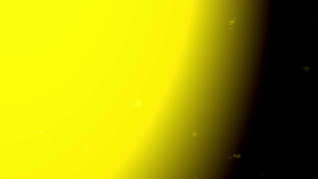 yellow light white spots on black background