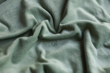 Mint green color fleece texture close up © splitov27