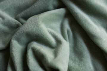 Mint green color fleece texture close up © splitov27