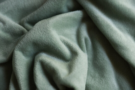 Mint green color fleece texture close up
