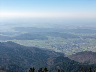 Black Forest with a view from the Blauen mountain near Schliengen in spring, drone photo