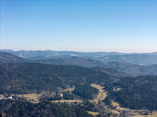 Black Forest with a view from the Blauen mountain near Schliengen in spring, drone photo
