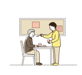 食事介助をする介護士 全身