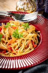Fried noodles with chicken and vegetables. © Arkadiusz Fajer