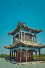 Ancient Chinese Pavilion with Ornate Blue Roof and Golden Details
