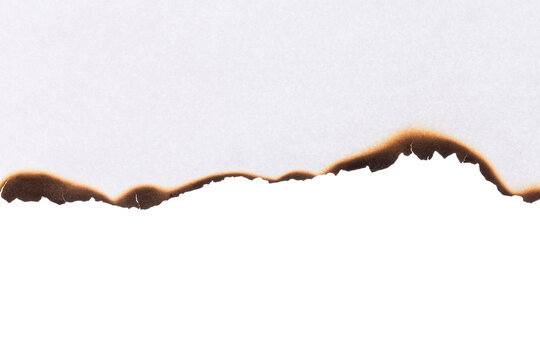 White paper with burnt edge detail and dark scorch marks