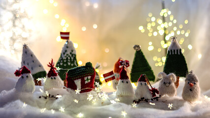 Christmas decorations from various knitted items, gnomes, snowmen, trees and houses, beautiful card, festive mood