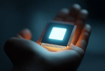 a computer chip in hand