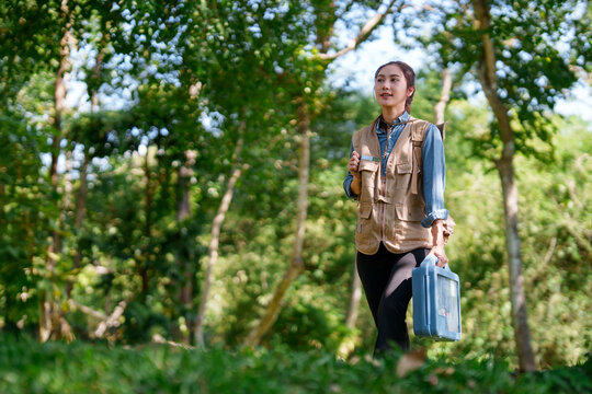 Asian Botanist Exploring Forest Wilderness Conducting Plant Research Discovering Biodiversity Natural Habitat Environment