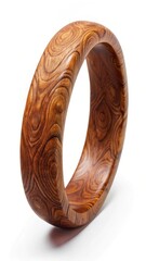 Brown wooden bangle bracelet with intricate patterns and texture on a clean white background