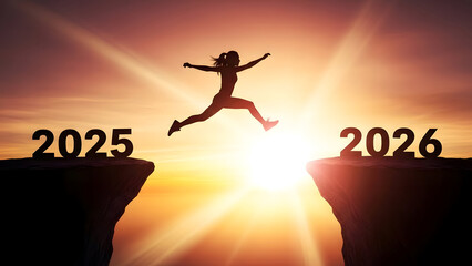 Full body silhouette of a woman leaping through the air from 2025 to 2026 against a bright sun flare for female empowerment and new year motivation