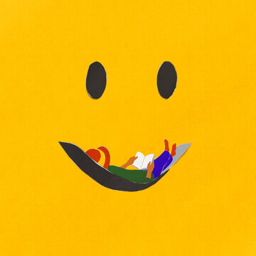 Woman reading in hammock forming smiley face