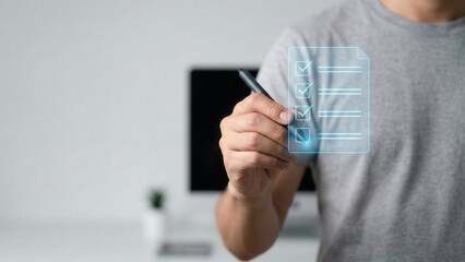 Man holding stylus checking items on virtual checklist hologram in minimal home office, focused productivity and planning
