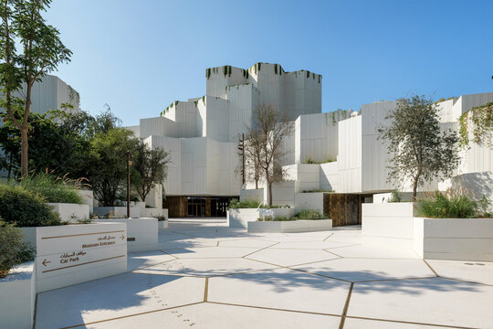 Abu Dhabi, UAE - 13 december 2025. Natural History Museum Abu Dhabi newly opened urban development with modern white facade green terraces and spacious pedestrian public plaza