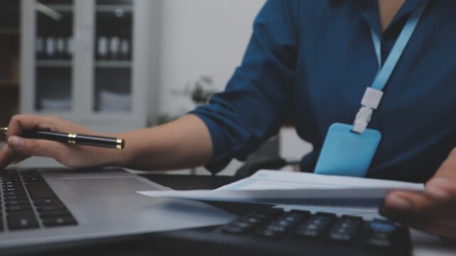 Accounting company provide finance and taxation planning for profitable cash flow, Auditor and accountant team working in office, analyze financial data and accounting record with calculator.Insight - Powered by Adobe