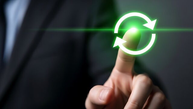 Businessman interacting with virtual refresh button