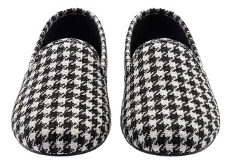 Black and white houndstooth patterned low-profile textile slippers.