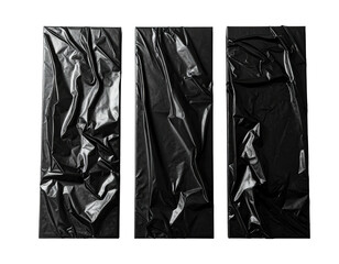 Three vertical panels of reflective, crumpled black material against a stark, black background
