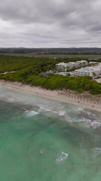 Vertical Aerial Approach to Cloudy Can Picafort Beach in Mallorca Spain