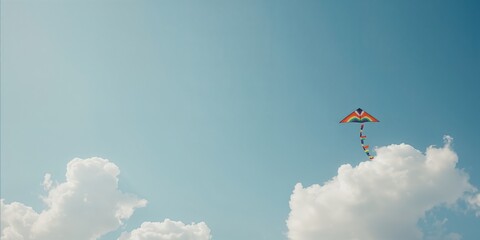 Vibrant rainbow kite in the air with fluffy clouds, highlighting recreational outdoor play