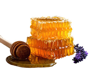Stacked honeycomb with wooden honey dipper and lavender against a black backdrop