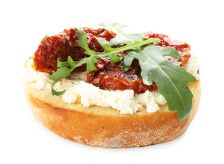 Delicious bruschetta with cream cheese, sun-dried tomatoes and arugula isolated on white