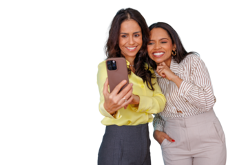 Two happy women friends taking a selfie with smartphone, enjoying time together and capturing memories