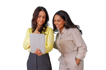 Successful businesswomen collaborating on a tablet, smiling and giving thumbs up, showing approval and teamwork