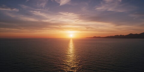 Obraz premium Atlantic Ocean scene during sunset, highlighting tranquil water surface and colorful sky for background use