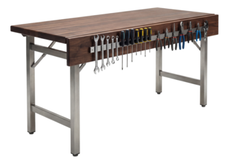 Folding workbench with a magnetic strip for tool storage in an engineering lab.