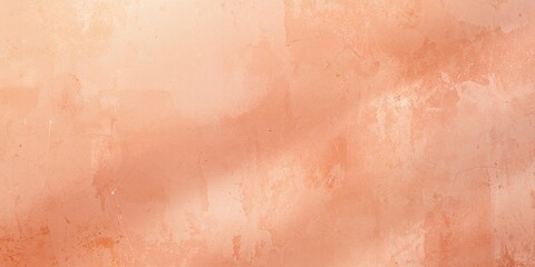 Peach-colored textured surface serving as a backdrop for graphic content or layout design
