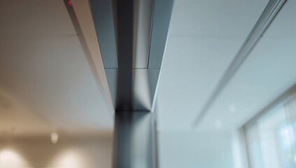 Metal ceiling sign viewed from the left, structural integrity and design