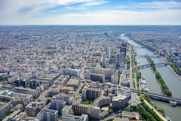 Fototapeta premium Aerial View of Paris with Seine River and Modern District