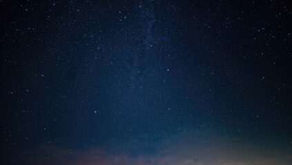 Clear night sky illuminated by stars, serving as a background for layout and design elements
